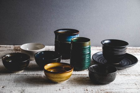 Ceramic cup molded from clay and burned with heat with filter effect retro vintage styleの写真素材