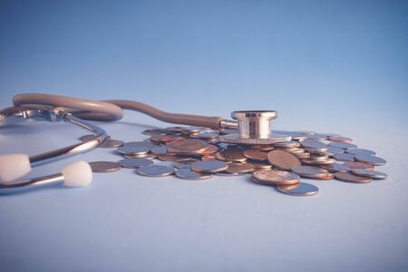 save money for investment concept Stethoscope and money  with filter effect retro vintage styleの写真素材