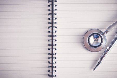 stethoscope and books with filter effect retro vintage styleの写真素材