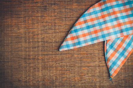 background wooden table with a tablecloth  with filter effect retro vintage styleの写真素材