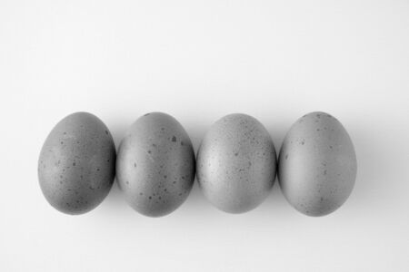 black and white chicken eggs are a popular food worldwide.の写真素材