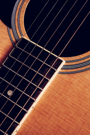 Close Up shot photo of Classic acoustic guitar with filter effect retro vintage styleの写真素材