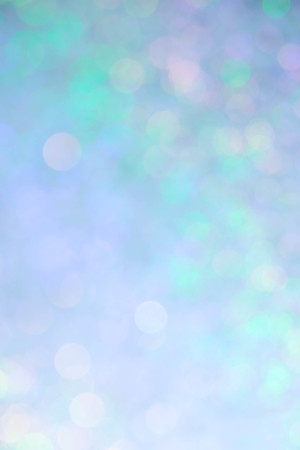 Abstract Christmas twinkled bright background with bokeh defocused lights . Lights Festive...