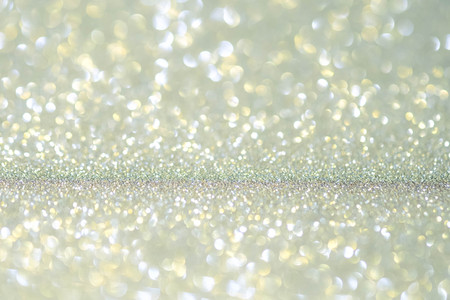 Abstract Christmas twinkled bright background with bokeh defocused lights . Lights Festive background concept.の写真素材