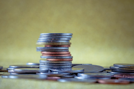 business finance. save money for investment concept coins with filter effect retro vintage styleの写真素材