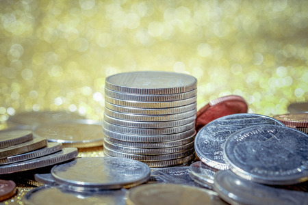 business finance. save money for investment concept coins with filter effect retro vintage styleの写真素材