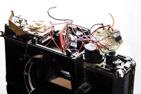 old retro vintage camera lens has been dropped and shatteredの写真素材