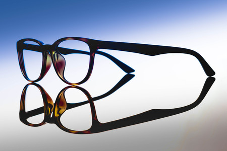glasses on light background. costume fashion concept
