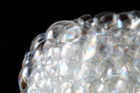 Abstract background white soapy foam texture. Shampoo foam with bubblesの写真素材