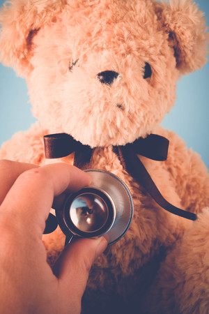 Health Care teddy bear Heart stethoscope with filter effect retro vintage styleの写真素材