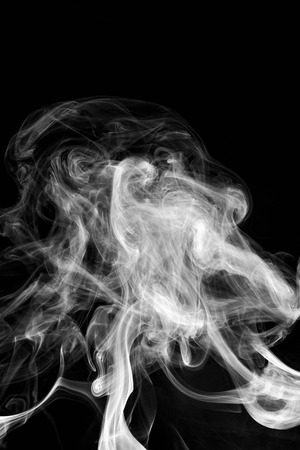 abstract background smoke curves and wave on black backgroundの写真素材