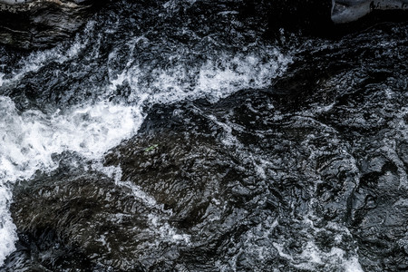 Abstract dark blue Waterfall wave water background texture