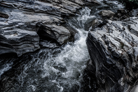 Abstract dark blue Waterfall wave water background textureの写真素材