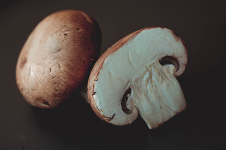 Mushrooms on the wood table raw materials for cookingの写真素材