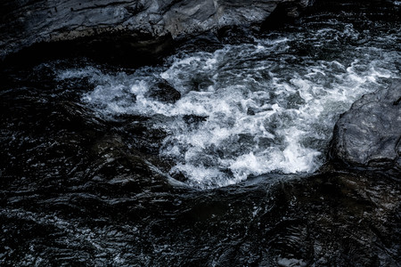 Abstract dark blue Waterfall wave water background texture