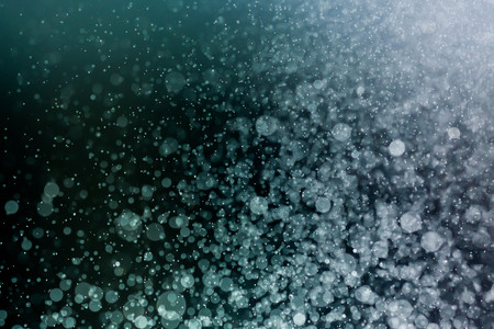 Christmas bokeh background texture abstract light glittering stars on bokeh. glitter vintage lights backgroundの写真素材