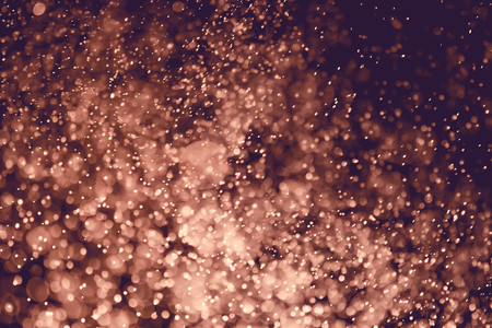 Christmas bokeh background texture abstract light glittering stars on bokeh. glitter vintage lights backgroundの写真素材