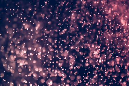 Christmas bokeh background texture abstract light glittering stars on bokeh. glitter vintage lights...