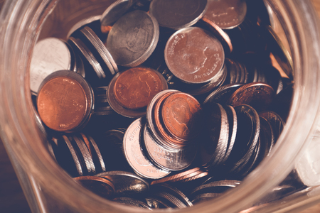 save money for investment concept, money in the glass with filter effect retro vintage style