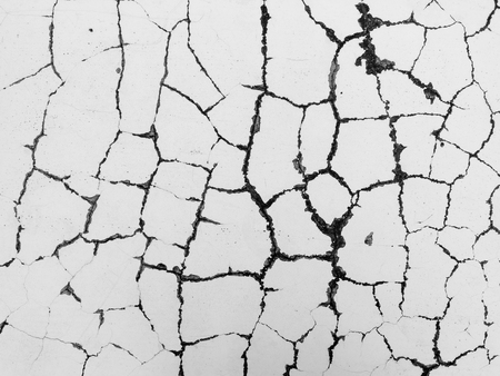 crack white concrete wall backgroundの写真素材