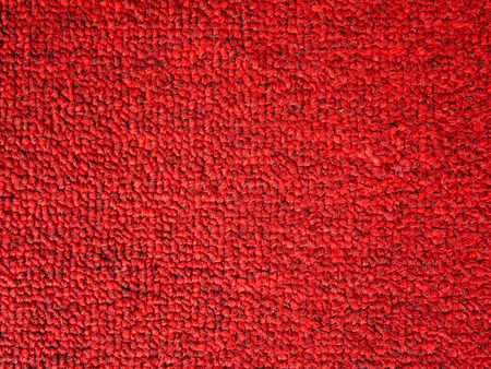 Elegance red color carpet texture backgroundの写真素材