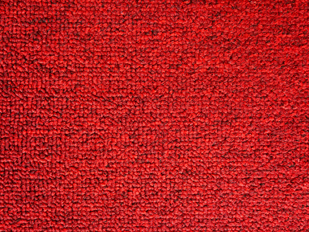 Elegance red color carpet texture backgroundの写真素材