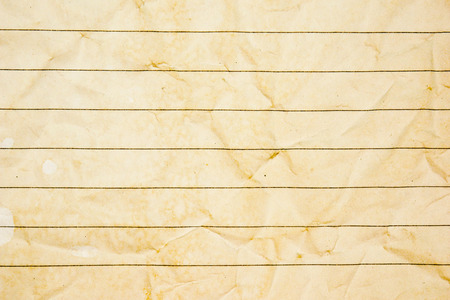 rough beige paper grunge background texture for designの写真素材