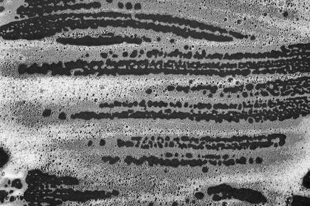 Abstract background white soapy foam texture. Shampoo foam with bubbles
