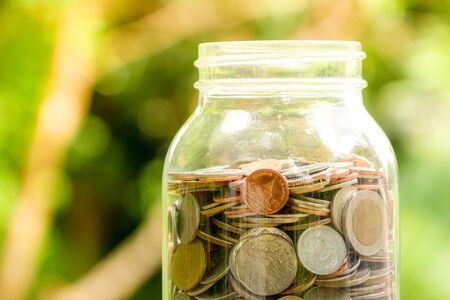 save money for investment concept, money in the glass