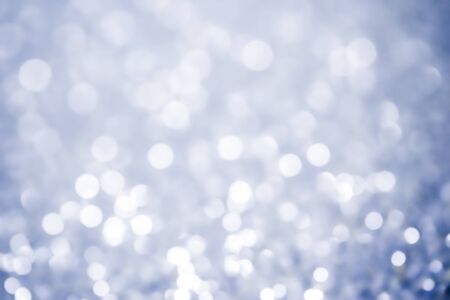 Christmas bokeh background texture abstract light glittering stars on bokeh. glitter vintage lights backgroundの写真素材