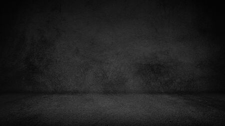 Cement floor background on studio room and spot light.Between darknessの写真素材