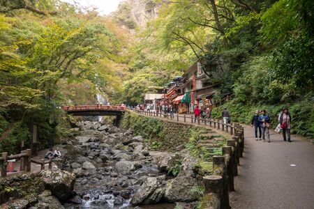 OSAKA, JAPAN - NOVEMBER 07, 2019: tourist Autumn season Red Maple Leaf Fall Foliage at Minoh waterfall in osaka, Japanのeditorial素材