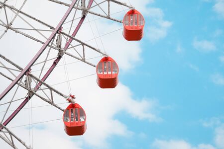 Ferris Wheel Over Blue Sky Background