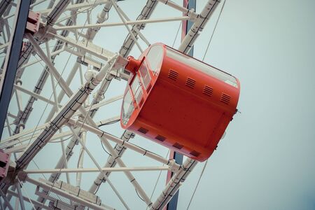 Ferris Wheel Over Blue Sky Background
