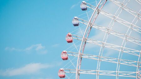 Ferris Wheel Over Blue Sky Backgroundの写真素材