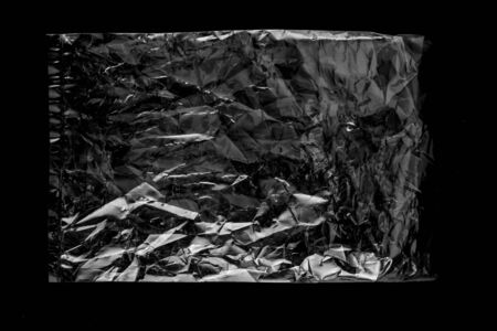 white plastic Bag on black backgroundの写真素材