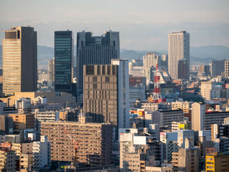 Osaka, Japan - november 09, 2019: Highrise cityscape crowded skyscrapers offices apartments Osaka Japanのeditorial素材