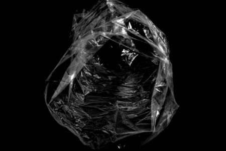 white plastic Bag on black backgroundの写真素材