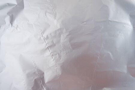 aluminium foil crumpled Silver texture abstract backgroundの写真素材
