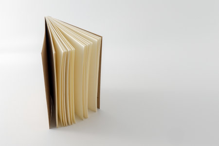 Recycled paper book on white backgroundの写真素材