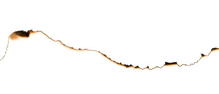 burnt paper on a white backgroundの写真素材