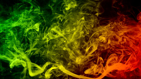 abstract background smoke curves and wave reggae colors green, yellow, red colored in flag of reggae musicの写真素材
