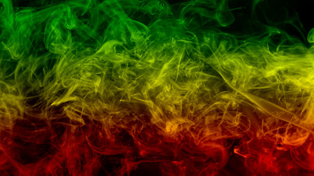 abstract background smoke curves and wave reggae colors green, yellow, red colored in flag of reggae musicの写真素材