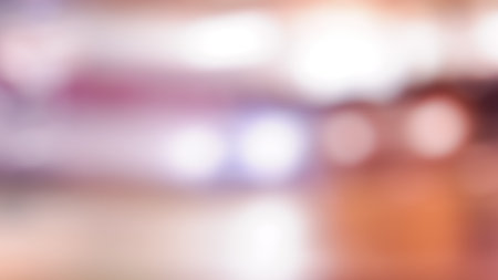 background of blurred lights at street road nightの写真素材
