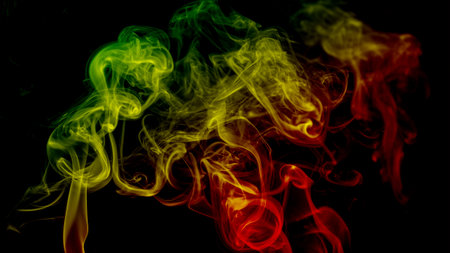 abstract background smoke curves and wave reggae colors green, yellow, red colored in flag of reggae musicの写真素材