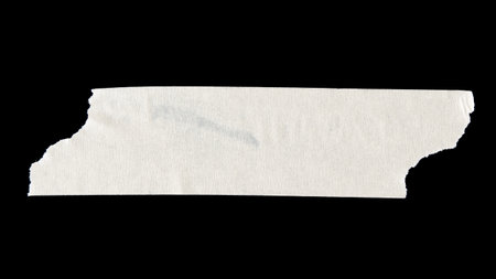 adhesive paper , masking tape isolated on black background