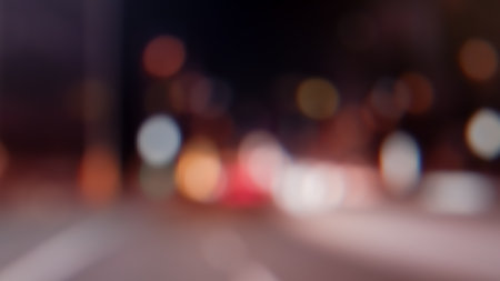 background of blurred lights at street road nightの写真素材