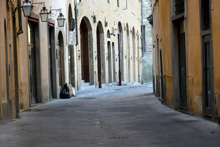 Empty  street between building in center city. Environment city life during confinement due to...