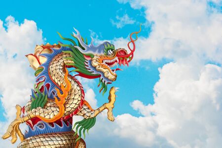 chinese dragon and blue sky backgroundの写真素材