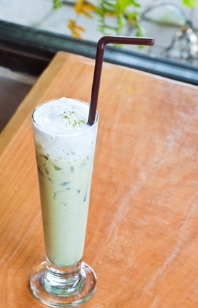 iced green tea on wood tableの写真素材